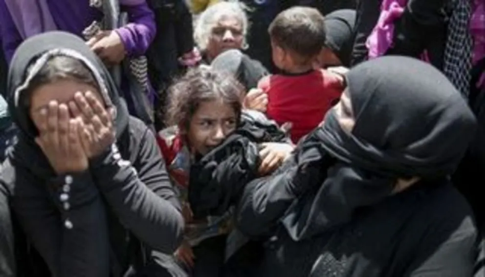 Mujeres y niños en el sur de Siria secuestrados por el Estado Islámico